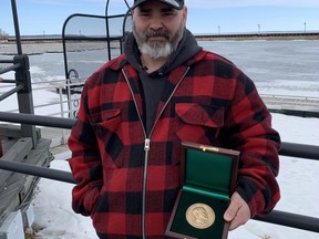 Ken Stead with his Carnegie Medal for bravery. PHOTO BY KELLY-ANNE RIESS/POSTMEDIA