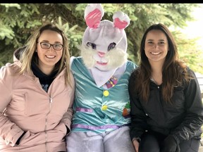 Lucknow Kinettes and event organizers Emilie Hogan and Krystal Younglao pose for a picture with the Easter bunny. SUBMITTED