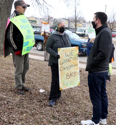 Fred Clement and Guylaine Poitras speak with Ward 5 Coun. Matthew Scott during demonstration supporting campground at Pointe des Chenes on Saturday, March 27, 2021 in Sault Ste. Marie, Ont. (BRIAN KELLY/THE SAULT STAR/POSTMEDIA NETWORK)