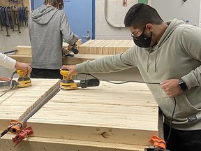 Fort High construction students built more than 100 beds to support Sherwood Park-based charity Sleep in Heavenly Peace. Photo Supplied