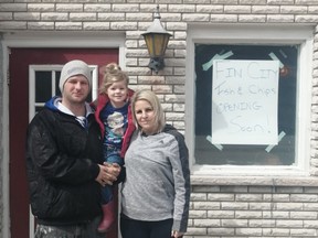 Owners of the Inverhuron location of Fin City Fish and Chips and convenience store Brad and Monique Gagnon with their daughter, Julie, outside of the location as they put the finishing touches together. Not pictured are their other two daughters Danika and Hailey. Hannah MacLeod/Kincardine News