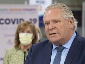 Premier Doug Ford and Health Minister Christine Elliott