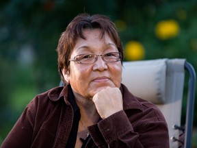 Alice Rigney poses for a photo at her home in Fort Chipewyan, Alta. on September 11, 2013. Ryan Jackson/Postmedia Network