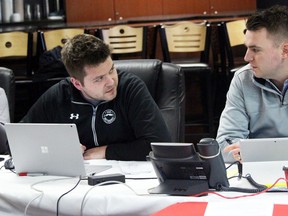 PETER RUICCI/Sault Star

Greyhounds general manager Kyle Raftis (right) discusses 2019 draft strategy with director of player personnel and development Patrick Sweeney