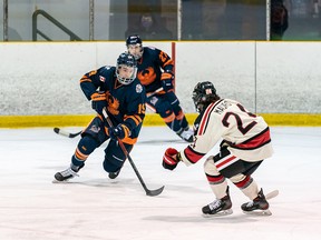 Photo Courtesy NOJHL

Soo Thunderbirds defenceman Dylan Parsons heads up ice while being defended by Justin Mauro, a Sault native and a member of the Blind River Beavers, in a recent NOJHL game.  The teams are scheduled to meet twice this weekend in Blind River.