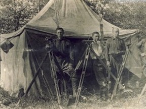 •	80.1137.000 – Four early surveyors posing with the tools of their trade – transit levels on tripods, a level staff/rod in the background leaning against a canvas tent in the bush – their office in the wild. Were it not for people such as these Dominion Land Surveyors with their mathematical and scientific skills and sense of adventure, the structure and information needed “for the rapid and orderly development of the West” would not have been possible.