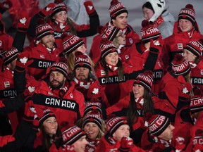 Canadas delegation parades during the opening ceremony of the Pyeongchang 2018 Winter Olympic Games at the Pyeongchang Stadium on February 9, 2018.