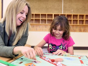 Big Brothers Big Sisters of Grande Prairie and area are actively looking for volunteers to mentor youth ranging from 6 and up on their waiting list. The organization is especially in need of men to become Big Brothers. Kailee Kirland (left) plays with Charley Allard, 7, at Avondale Elementary School  in a 2016 File photo. FILE PHOTO Svjetlana Mlinarevic