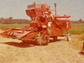 Fred Hermann, pictured here with his first combine, farmed for 40 years in Straffordville. Photo submitted by Hermann family.
