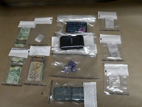 Drumheller RCMP seize drugs and lay charges after executing search warrant.
