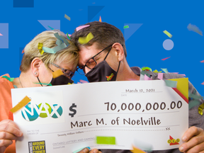 Marc Meilleurand his wife, Dorothy-Ann, celebrate his $70-million Lotto Max win in a virtual ceremony.