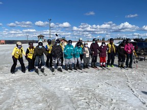 Participants from the March 19 ECHO Society ski day prepare to hit the slopes for a lesson as part of the town's RECreate grant program.