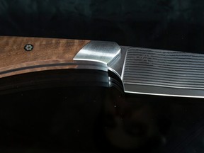 Blacksmith and knife-maker Alessio Zilli of AZ Custom Knives Ltd. creation the Raptor, an all purpose kitchen knife.  RANDY VANDERVEEN.  PHOTO RANDY VANDERVEEN