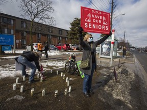 People demonstrate in support of the well-being of long-term care home residents outside of Kennedy Lodge Long Term Care Home in Scarborough.