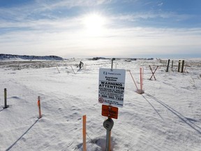 The route of the Keystone XL crude oil pipeline lies idle through a farmer's field near Oyen, Alberta, Canada February 1, 2021.  REUTERS/Todd Korol/File Photo