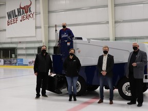 Members of Leduc City Council welcomed the city’s first ever electric powered Zamboni to the Leduc Recreation Centre on Wednesday, March 10. The Zamboni is the first of its size in Alberta and is expected to improve ice quality for users while reducing fuel costs and water consumption. Left to right: Coun. Bill Hamilton, Mayor Bob Young, Coun. Laura Tillack, Coun. Lars Hansen and Coun. Glen Finstad. (Supplied by City of Leduc)