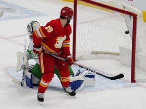 Calgary Flames forward Dillon Dube watches a shotgo past Leafs goalie Frederik Andersen on Friday night. USA TODAY