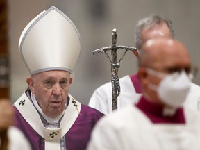 Pope Francis arrives to lead Catholics into Lent with the Ash Wednesday mass in St. Peter's Basilica at the Vatican, February 17, 2021.