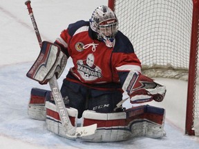 Stratford Warriors goalie Tyler Parr watches the puck into his glove during a win over Listowel last season. (Cory Smith/The Beacon Herald)