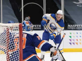 UNIONDALE, NEW YORK - MARCH 04: Eric Staal #12 of the Buffalo Sabres fires a shot over Ilya Sorokin #30 of the New York Islanders during the first period at the Nassau Coliseum on March 04, 2021 in Uniondale, New York.