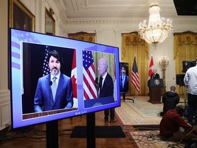 U.S. President Joe Biden and Prime Minister Justin Trudeau, appearing via video conference call, give closing remarks at the end of their virtual bilateral meeting from the White House in Washington, U.S. February 23, 2021.