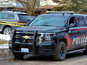 Members of Belleville Police Criminal Investigation Division and Forensics Unit were on scene of an east end home where the discovery of a woman's body was made March 9. The man charged with murder appears in Belleville court Thursday via video link. DEREK BALDWIN