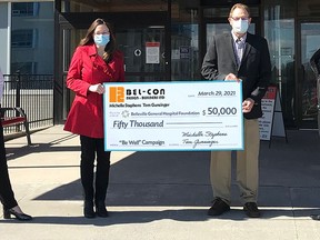 QHC President and CEO Stacey Daub (left) and BGHF Executive Director Steve Cook (right) accept a $50,000 cheque from Michelle Stephens and Tom Gunsinger from Bel-Con Design Builders for the BGHF's "Be Well" Campaign. SUBMITTED PHOTO