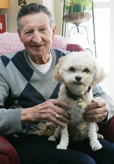 Walter Gretzky in his Brantford home with his dog, Leona, in  2012. CHRISTOPHER SMITH/ Expositor file photo