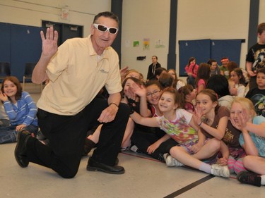 Walter Gretzky visits with students at Christ the King School in 2011 to promote a Canadian Natonal Institute for the Blind program that encourages Canadians to slip on their sunglasses tto protect their eyes from UV damage. Wendy Oliver/Expositor file photo