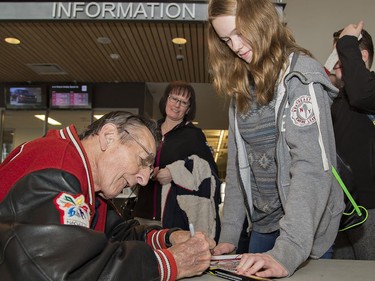 Walter Gretzky autographs a hockey stick for Logan Gillingham, 13 of Kitchener, Ontario on Saturday January 9, 2016 at the 18th annual Walter Gretzky House League Tournamet at the Wayne Gretzky Sports Centre in Brantford, Ontario. Brian Thompson/Brantford Expositor/Postmedia Network