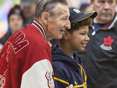 Canada's greatest hockey dad Walter Gretzky poses for a photograph with 12-year-old Cameron Manitowabi of Sudbury during an autograph session on Saturday January 5, 2019 at the Wayne Gretzky Sports Centre in Brantford, Ontario. The 21st annual Walter Gretzky International house league hockey tournament attracted 108 teams from atom to midget levels. Brian Thompson/Brantford Expositor/Postmedia Network