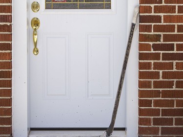 Brantford city councillor John Sless is encouraging everyone to place a hockey stick on their front porch as a tribute to Walter Gretzky, Canada's beloved hockey dad who passed away Thursday at his Brantford home at the age of 82. Brian Thompson/Brantford Expositor/Postmedia Network