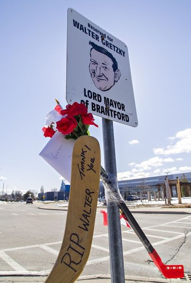 Tributes adorn the parking spot reserved for Walter Gretzky at the Wayne Gretzky Sports Complex in Brantford, Ontario on Friday March 5, 2021. Canada's best-known hockey dad passed away Thursday at his home, surrounded by his family. Brian Thompson/Brantford Expositor/Postmedia Network