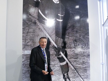Walter Gretzky poses in front of a larger than life image of him playing hockey as a boy. The photo, taken Novemver 22, 2014 is in the new Brantford and Area Sports Hall of Recognition that had just opened.  
Michael-Allan Marion / Brantford Expositor / Postmedia Network