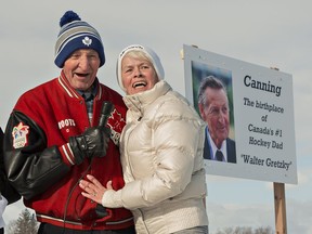 Carol Hutchinson embraces Walter Gretzky following a sign unveiing on Saturday December 10, 2016 in the village of Canning, west of Brantford, Ontario. The sign, erected at the edge of the village where he grew up, bears a photo of him with the wording "Canning: The birthplace of Canada's #1 Hockey Dad Walter Gretzky." Hutchinson attended Canning School with Gretzky, in a one-room schoolhouse where the teacher had 30 children ranging from kindergarten to grade 8. Brian Thompson/Brantford Expositor/Postmedia Network