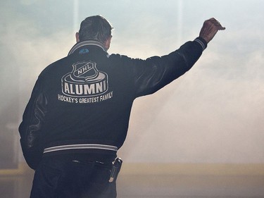 Often referred to as Canada's greatest hockey dad, Walter Gretzky waves to the crowd as he is introduced as the honorary coach of the NHL Alumni team on Sunday, December 14, 2014 at the Wayne Gretzky Sports Centre in Brantford, Ontario. Gretzky has passed away at his Brantford home at the age of 82.