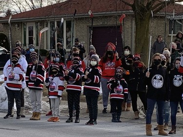 A couple of hundred people, many of them wearing sports jerseys and holding hockey sticks, lined the street outside St. Mark's Anglican Church where a funeral service was held on Saturday for Walter Gretzky. MICHELLE RUBY/ BRANTFORD EXPOSITOR