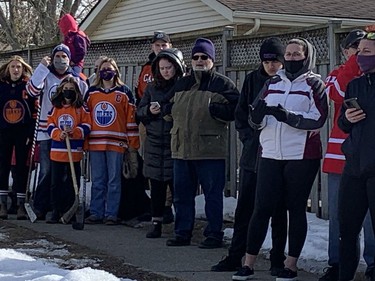 A couple of hundred people, many of them wearing sports jerseys and holding hockey sticks, lined the street outside St. Mark's Anglican Church where a funeral service was held on Saturday for Walter Gretzky. MICHELLE RUBY/BRANTFORD EXPOSITOR