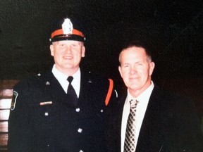 Brantford police Det. Const. Matt Roberts, shown with his father, Rick, has received two nominations for a Police Association of Ontario award.