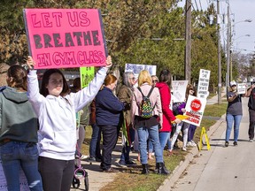 About 50 people gathered in front of the Grand Erie District School Board offices on Erie Avenue in Brantford for Kids Strike for Freedom on Tuesday morning March 30, 2021. Brian Thompson/Brantford Expositor/Postmedia Network