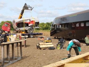 Workers create sets for Season 2 of the TV show, Departure, which was the productions filmed in Brantford last year.