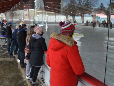 Spectators are spread out around the Rotary Park ice pad to watch the scrimmage between the Brockville Braves and Kemptville 73's on Sunday afternoon. Attendance was limited to 100 because of COVID-19 guidelines.
Tim Ruhnke/The Recorder and Times