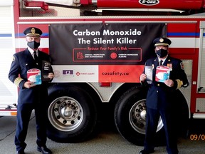 Ready to launch a new carbon monoxide awareness campaign in partnership with the TSSA and the Hawkins Gignac Foundation, from left, Brockville Fire Chief David Lazenby and Deputy Chief Andy Guilboard, of  Elizabethtown-Kitley, hold carbon monoxide alarms. (SUBMITTED PHOTO)