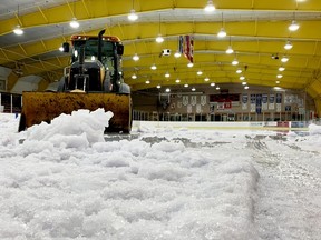 Workers finished clearing the ice from the Memorial Centre arena on Wednesday, ahead of turning the space into an extra COVID-19 vaccination area next month. (RONALD ZAJAC/The Recorder and Times)