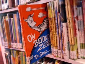 The controversy over six children's books by Dr. Seuss isn't touching the Chatham-Kent Public Library. That's because the books – which Dr. Seuss Enterprises said earlier this month it will stop publishing because of racist imagines – aren't part of the local library's collection.The books shown in this photograph are found in a Chicago city library. Scott Olson/Getty Images