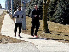 Aaron Handsor, left, and Mark Meko, raised awareness of mental health along more than $3,500 by doing an endurance run that consisted of running four kilometres every four hours for 48 hours straight. (Contributed Photo)