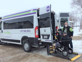 ONE CARE provides accessible transportation to seniors, and thanks to the Ontario Trillium Foundation the agency has purchased two new vehicles. In this photo staff driver Bill Branderhorst assists a client into the van. SUBMITTED