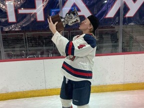 Allyson Hebert, of St. Andrews West, gets her turn with the cup, after the Robert Morris Colonials won the College Hockey America conference playoff final, beating Syracuse 1-0 on Saturday night in Erie, Pa.Handout/Cornwall Standard-Freeholder/Postmedia Network

Handout Not For Resale