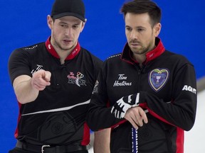 Ontario's Mat Camm (left), of Cornwall, and skip John Epping consider options during a match at the Tim Hortons Brier in Calgary, Alta.Handout/Curling Canada/ Michael Burns Photo/Cornwall Standard-Freeholder/Postmedia Network

Handout Not For Resale