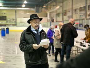 Rockland mayor Guy Desjardins reads a statement at the Rockland vaccination facility on Friday, March 19, 2021 in Rockland, Ont. Jordan Haworth/Cornwall Standard-Freeholder/Postmedia Network
